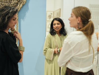 Shafeena Yusuff Ali, centre, is the founder and executive director of Rizq Art Initiative. Photo: Rizq Art Initiative