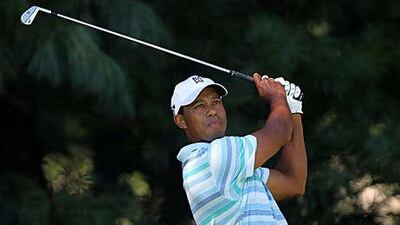 Tiger Woods watches a tee shot during the second round of the Barclays Classic yesterday.