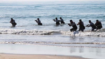 Iranian soldiers during a military exercise in the Gulf, near the strategic strait of Hormuz in southern Iran during a three-day exercise. AFP, HO via Iranian Army website