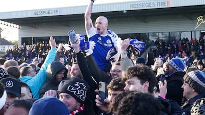 Macclesfield's Josh Kay celebrates with fans following the FA Cup third round match. PA