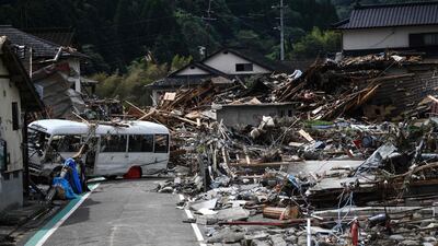 Debris litter a village following heavy rain in Kumamura, Kumamoto prefecture. AFP