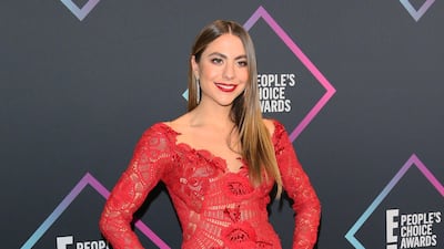 Claudia Vergara - niece of Sofia - wore scarlet lace. Photo / AFP