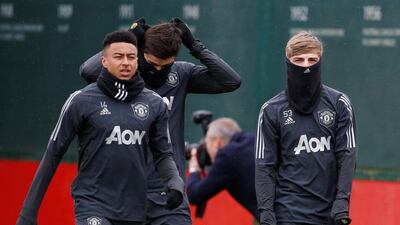 Left to right: Manchester United's Jesse Lingard, Brandon Williams and Harry Maguire. Reuters