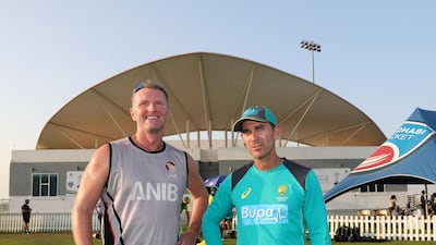 Head coaches Dougie Brown of UAE and Justin Langer Australia at the end of the match.