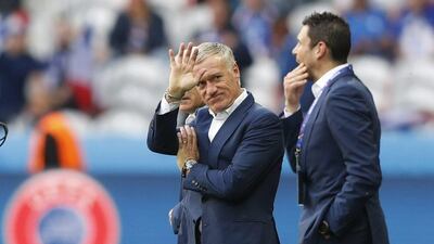 France coach Didier Deschamps acknowledges the crowd ahead of the game. Carl Recine / Reuters