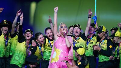 The Australian women's cricket team perform on stage with US pop star Katie Perry after they won the T20 World Cup final against India at Melbourne Cricket Ground on Sunday, March 8. EPA