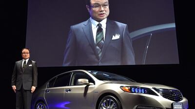 Honda president and chief executive Takanobu Ito said that while the carmaker is sticking to the global sales target, it is not the top priority. Kazuhiro Nogi / AFP