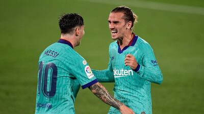 Barcelona's Antoine Griezmann celebrates with Lionel Messi after scoring against Villarreal. AFP