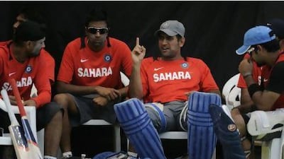 Captain MS Dhoni, second from right, has kept the Indian team away from the media. Indranil Mukherjee / AFP