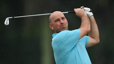 Thomas Bjorn, captain of Team Europe, plays a shot during the Eurasia Cup Pro-Am at Glenmarie G&CCin Kuala Lumpur, Malaysia. Stuart Franklin / Getty Images