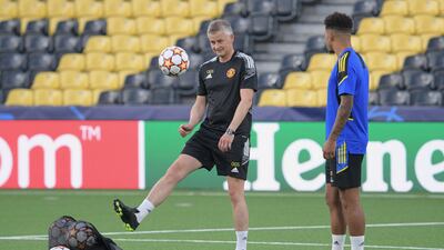 Manchester United manager Ole Gunnar Solskjaer with Jadon Sancho. AFP