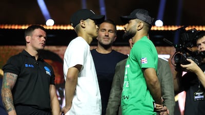 Hayato Tsutsumi, left, and Qais Ashfaq face off. Getty Images