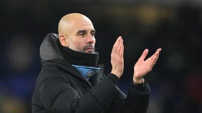 Manchester City's manager Pep Guardiola applauds fans. EPA