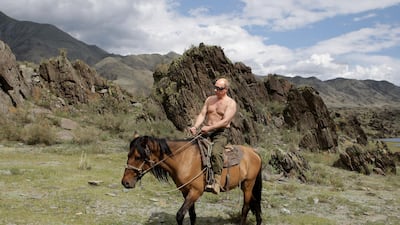 Putin rides a horse during his vacation outside the town of Kyzyl on August 03, 2009. AFP