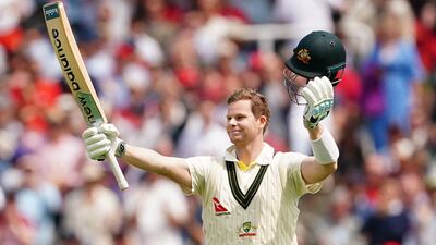 Australia's Steve Smith celebrates reaching his century. PA