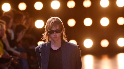 Low-cut trousers were mainstays. AFP