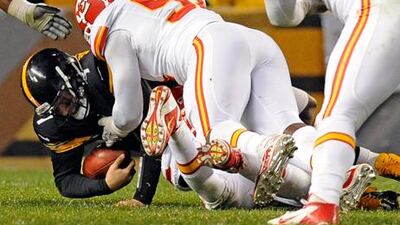 Pittsburgh Steelers' Ben Roethlisberger is sacked by Kansas City linebacker Tamba Hali