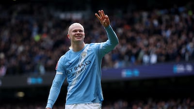 Manchester City's Erling Haaland celebrates scoring his third goal against Liverpool in their FA Cup quarter-final. Reuters