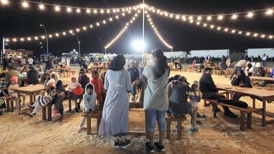 There were food stalls available at Al Hamra for those waiting to see the display. Chris Whiteoak / The National