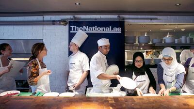 Centre left, Jordan Annabi, chef de cuisine, and, centre right, Sudhanshu Nirmal, executive sous chef, at Le Royal Méridien Abu Dhabi, make desserts at The National’s #healthyliving cooking experience. Silvia Razgova / The National