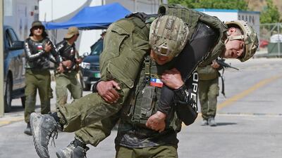 Soldiers from Chile participate in the Annual Warrior contest. AFP
