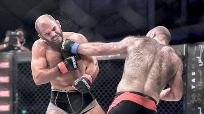 Brave Combat Federation 27 at the Mubadala Arena. Middleweight: (L) Tarek Suleiman (SYR) gets punched on the chin by Rustam Chsiev (RUS). Victor Besa / The National