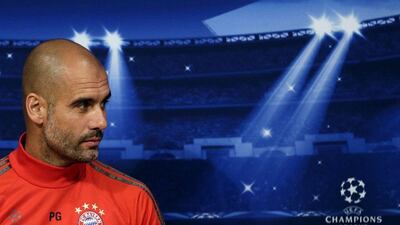 Bayern Munich manager Pep Guardiola shown at Tuesday's press conference ahead of the Wednesday Champions League semi-final first leg against Barcelona. Alberto Estevez / EPA / May 5, 2015