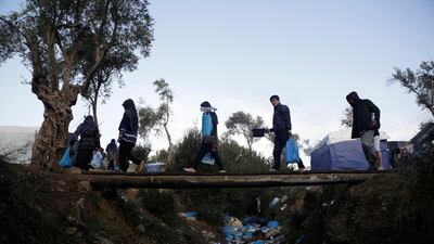 Migrants at a makeshift camp on the Greek island of Lesbos on Friday. Reuters