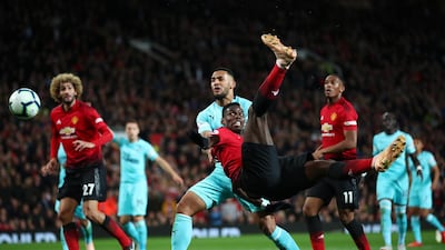 Manchester United's Paul Pogba attempts an overhead kick. Getty Images