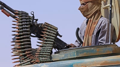 A Sudanese fighter in the west of Omdurman. The country's civil war has displaced millions. AFP