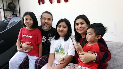 Jeff and Ritch Briones live in Discovery Gardens, Dubai, with their children Juris, Olivia and Jian. All photos: Chris Whiteoak / The National