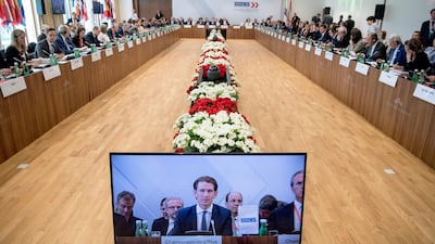 Austrian foreign and OCSE chairperson-in-office minister Sebastian Kurz is seen on a TV screen as he addresses the participants of the Informal Organization for Security and Co-operation in Europe (OSCE) foreign ministers' meeting in Mauerbach, Austria. EPA/Christian Bruna