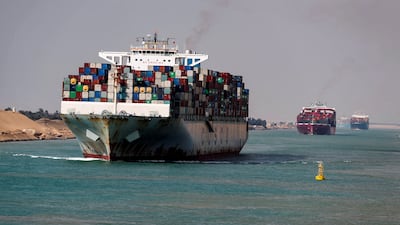 Shipping containers pass through the Suez Canal in Egypt. Reuters