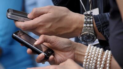 Many carmakers push new models via social media. Jay Directo / AFP