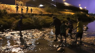 Migrants from Venezuela cross the Rio Bravo towards the US side, from Ciudad Juarez, Chihuahua state, Mexico. EPA