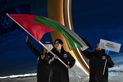 UAE's flag bearer Alex Astridge during the opening ceremony in Livigno. AFP