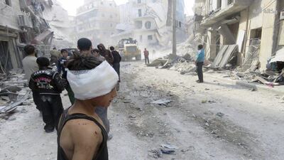 This image released by the Thiqa News Agency shows an injured child after airstrikes in Aleppo on November 16, 2016. Thiqa News via AP