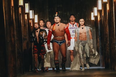 Mongolian wrestler Orkhonbayar Bayarsaikhan, centre, is his country's team leader. Photo: Netflix