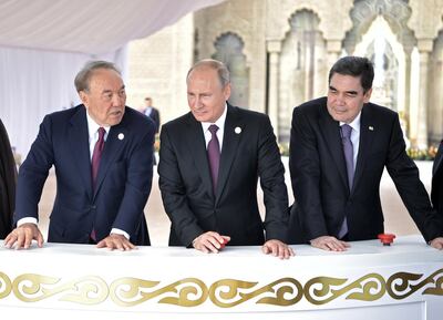 President of Kazakhstan Nursultan Nazarbayev (L), President of Russia Vladimir Putin (C) and President of Turkmenistan Gurbanguly Berdimuhamedow.