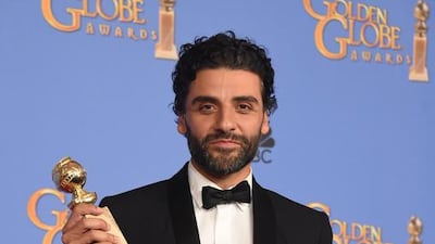 Oscar Isaac poses in the press room with his award for Best Actor — Limited Series or TV Movie, at the 73rd annual Golden Globe Awards. Frederic J Brown / AFP photo