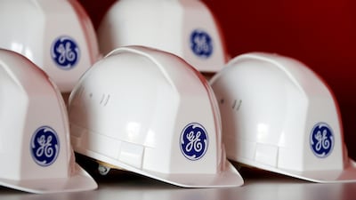 General Electric logo on work helmets. The company is under pressure as its gas turbines develop technical problems. Reuters