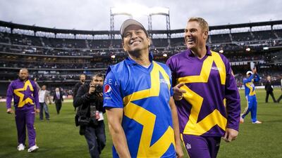 Sachin Tendulkar and Shane Warne shown after the all-star Twenty20 cricket match in New York City on Saturday. Dominick Reuter / Reuters / November 7, 2015