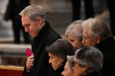 Archbishop Georg Ganswein pays his respect to Pope Emeritus Benedict XVI at St Peter's Basilica in the Vatican. AFP