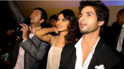 From left, the director Kunal Kohil, Priyanka Chopra and Shahid Kapoor at Vox Cinemas in Mall of the Emirates for the premiere of their new film Teri Meri Kahaani. Razan Alzayani / The National