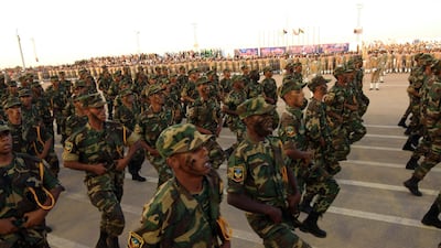 Soldiers from the self-styled army of Libyan Strongman Khalifa Haftar take part in a military parade in Benghazi on May 7, 2018, during which Haftar announced a military offensive to take the city of Derna. AFP/Abdullah DOMA