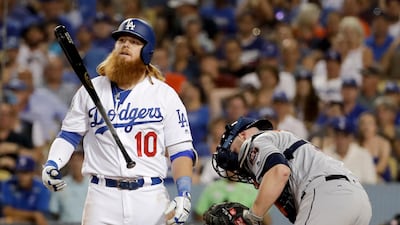 Los Angeles Dodgers' Justin Turner reacts after striking out against the Houston Astros during the eighth inning of Game 1 of baseball's World Series. Matt Slocum / AP Photo