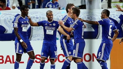 Al Nasr's Ibrahima Toure, left, left Dubai just before the team started assembling for their pre-season preparations. The player is yet to report for duty and the club management claim they do not know his whereabouts. Satish Kumar / The National