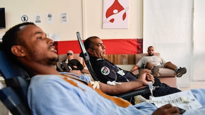 People make donations at a blood transfusion centre in Marrakesh after the powerful earthquake. EPA