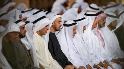 President Sheikh Mohamed prays during an iftar reception at the Sea Palace, with Sheikh Rashid bin Hamdan Al Nahyan, Sheikh Saif bin Zayed, Deputy Prime Minister and Minister of Interior, Sheikh Saud bin Saqr Al Qasimi, Ruler of Ras Al Khaimah, Sheikh Dr Sultan bin Muhammad Al Qasimi, Ruler of Sharjah, Sheikh Hamad bin Mohamed Al Sharqi, Ruler of Fujairah, and Sheikh Saud bin Rashid Al Mualla, Ruler of Umm Al Quwain. All photos: UAE Presidential Court