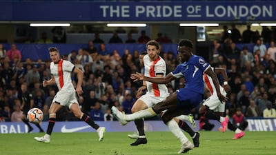 Chelsea's Nicolas Jackson, right, shoots at goal. AP